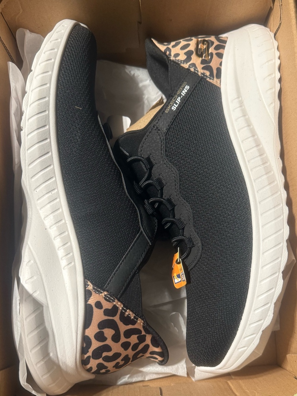 Skechers Black Slip-On Athletic Sneakers with leopard detail